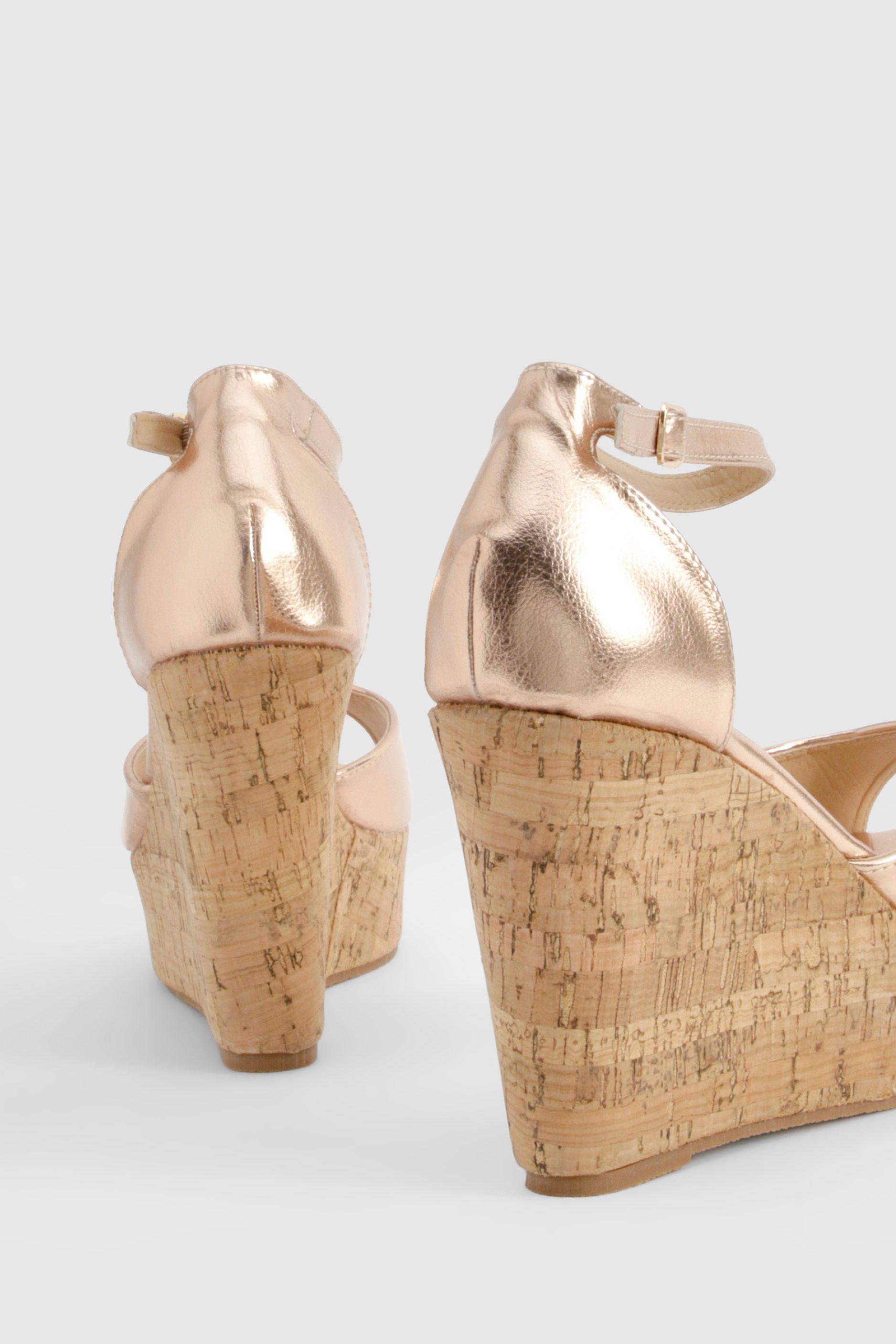 Scarpe con suola in sughero metallizzata e zeppe